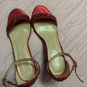 Women’s red bedazzled high heels